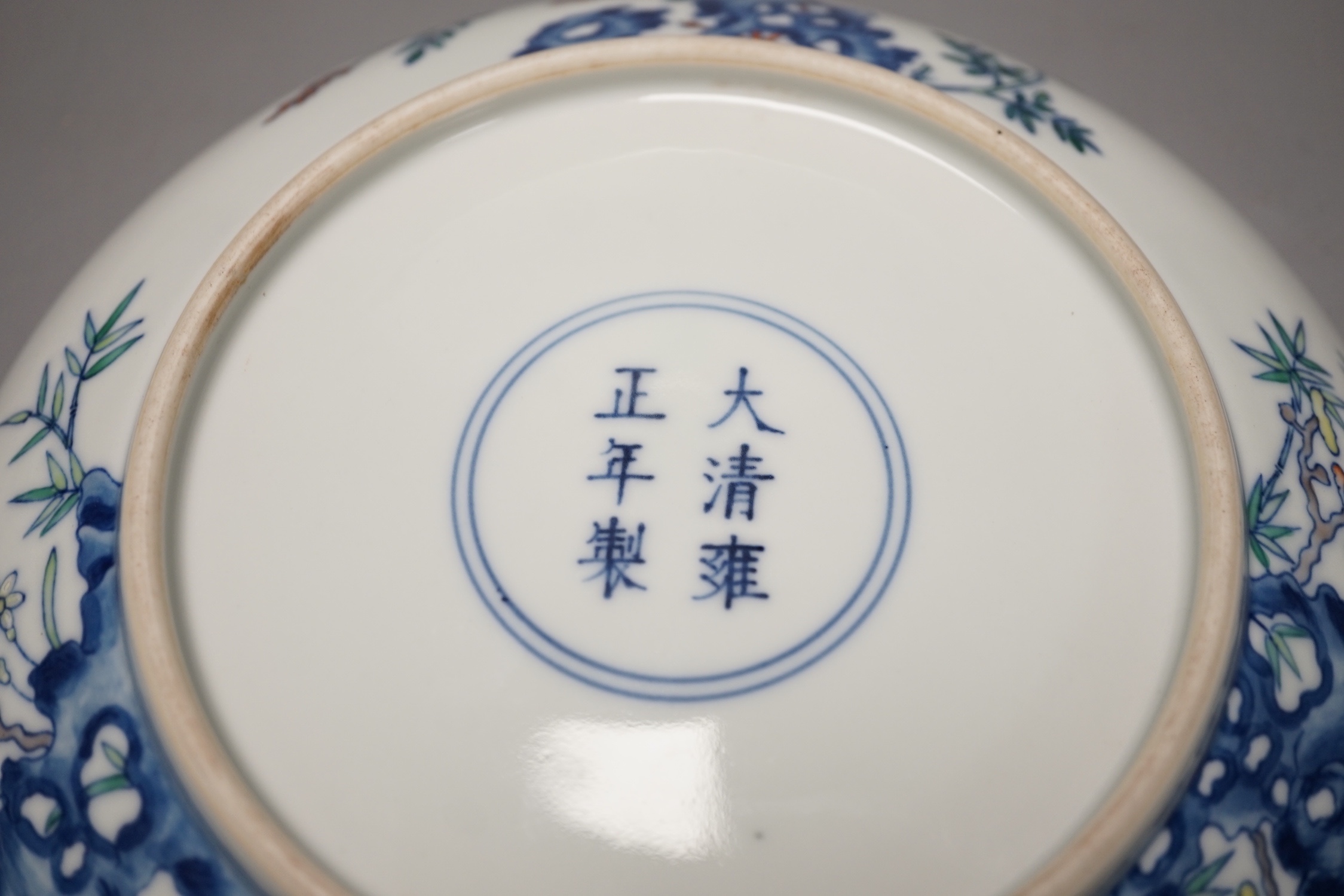 A Chinese doucai saucer dish, Yongzheng mark but later 20cm diameter